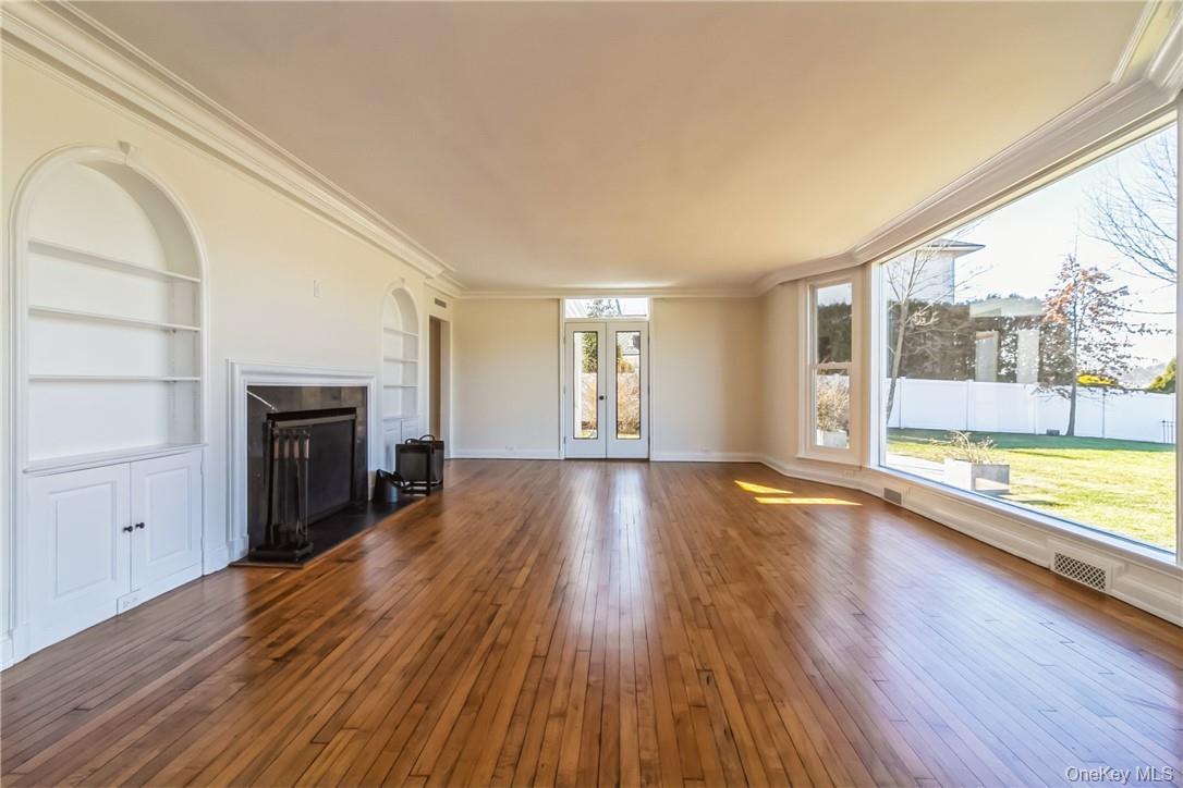 Living rm with doors to  the patio.