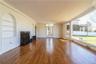 Living rm with doors to  the patio.