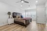 The primary  bedroom is very large with room for a sitting area.
