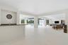 4000 sq ft lanai with covered areas, bar, & outdoor kitchen