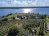 A rare opportunity to own one of Auburndale’s most impressive private estates. Set on 44.30 beautifully landscaped acres with more than 2,300 feet of 