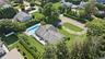 Aerial view of residential area with a pool