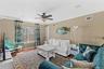 Hardwood-finish flooring, crown molding, and recessed lighting