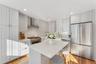 Kitchen featuring a breakfast bar, countertops, and stainless steel appliances