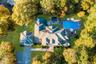 View of subject property with a pool