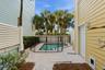 Private, heated salt water pool just steps to the beach