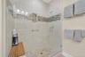 Bathroom featuring a shower stall