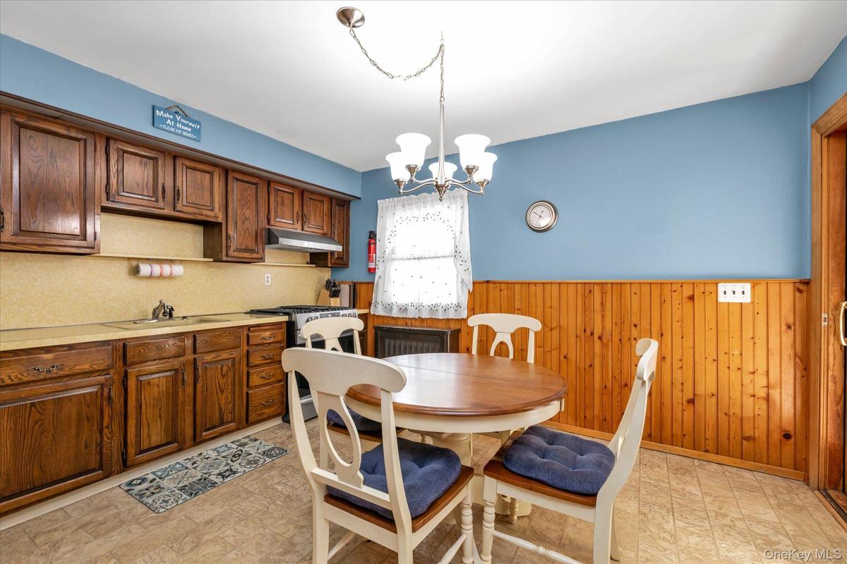 Eat In Kitchen with SS Appliances and Solid Wood Cabinets