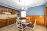 Eat In Kitchen with SS Appliances and Solid Wood Cabinets
