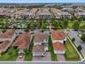 Conveniently located across the street from the community pool, playground and park!