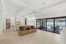 Stackable sling doors open to blend the outside with the inside