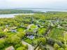 View of property location with property parcel outlined and a large body of water