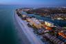 This one-of-a-kind Indian Shores property epitomizes coastal living, day and night