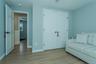 Sitting room featuring light hardwood / wood-style floors and a baseboard radiator