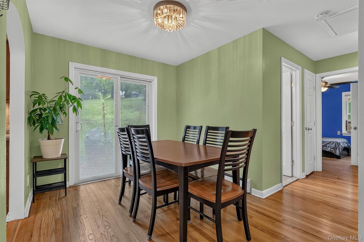 Dining room features sliding glass doors providing easy access to the patio and backyard.