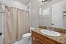 En suite bath with a tub