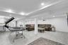 Rec room with recessed lighting and baseboards