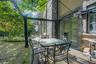 View of patio with outdoor dining area