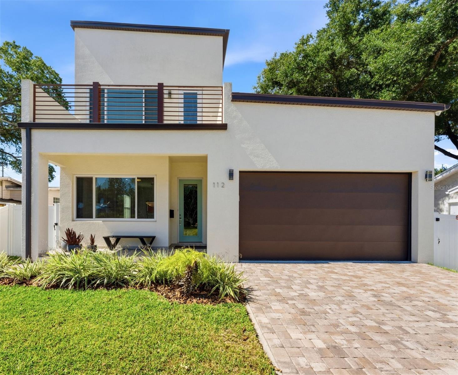 Welcome to Seminole Heights! This newly built home has open concept living with upscale finishes and is steps from Tampa's award winning dining, local
