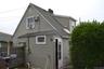 Rear house showing side door entrance to kitchen