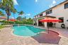 The shallow (6"-8") platform entry with built-in sunbrella is a great spot to splash in the cool water with the little ones