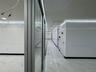 Hallway with marble finish floor