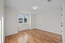 Spare room with light wood finished floors and baseboards