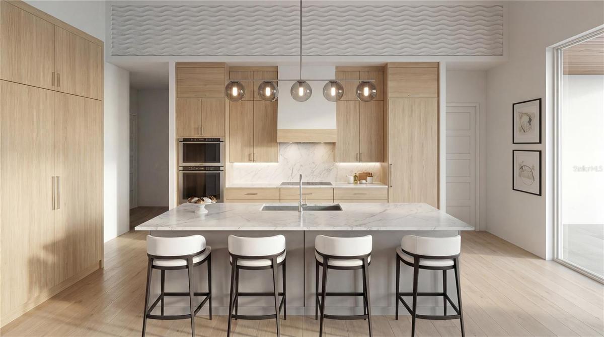 Gourmet kitchen with hidden pantry; stacked high end cabinetry and integrated LG Signature appliance package. Great entertaining space with large isla