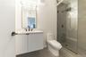 Full bathroom featuring a stall shower and vanity