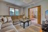 Living room with wood finished floors and baseboards