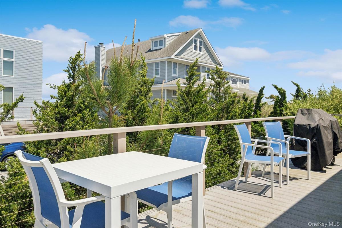 Deck featuring area for grilling