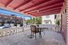 View of patio with outdoor dining area