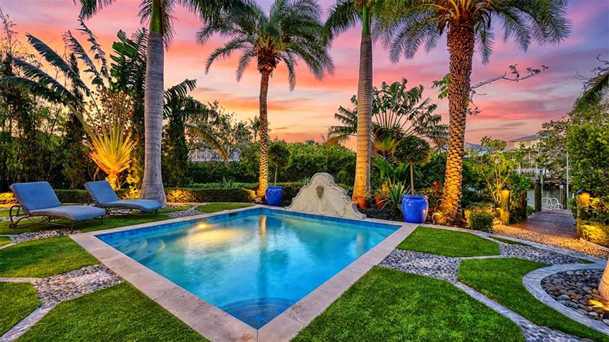Private resort-style pool at sunset