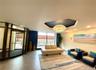 Lobby featuring a wall of windows