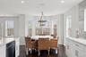 Dining space with recessed lighting, baseboards, and dark wood finished floors