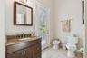 This is the ensuite full bath connected to the prior photos and has a entrance too the backyard and pool area.