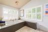 Primary Bathroom extra large soaking tub.