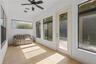 Florida room in back of home provides stunning conservation views with central AC