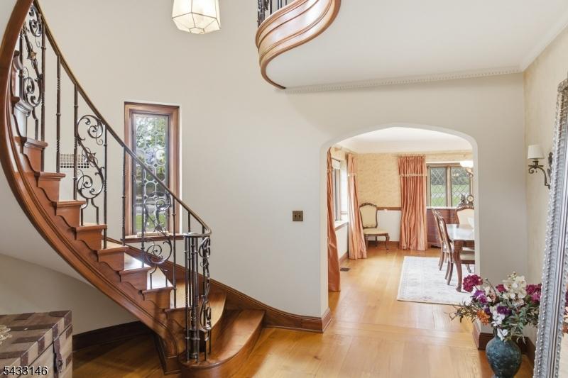 grand staircase and dining