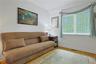 This is the Den. It can also be utilized as an in-home office or if needed a third Bedroom.