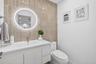 Upgraded powder room downstairs for the guests w/ feature wall