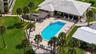 Aerial view of clubhouse and pool.
