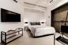 Bedroom featuring a wall unit AC