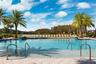 Resort style community clubhouse with a community pool, fitness center and lake front pool.