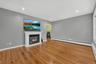 Open view from the living room into the dining room creates a comfortable flow between the main living spaces.