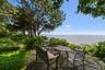 View of patio / terrace with a water view