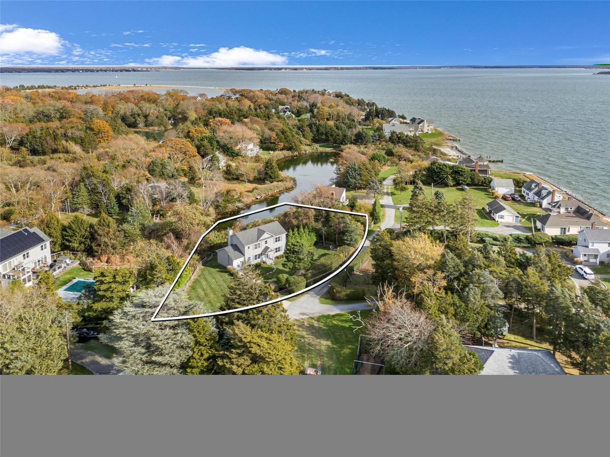 Aerial overview of property's location featuring property boundaries