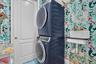 Upstairs laundry room close to primary suite. Large storage closet attached.