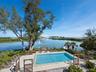 You may never want to leave the pool but if you do, the beach is just across the waterway or just down the street