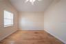 Comfortable additional bedroom with natural light